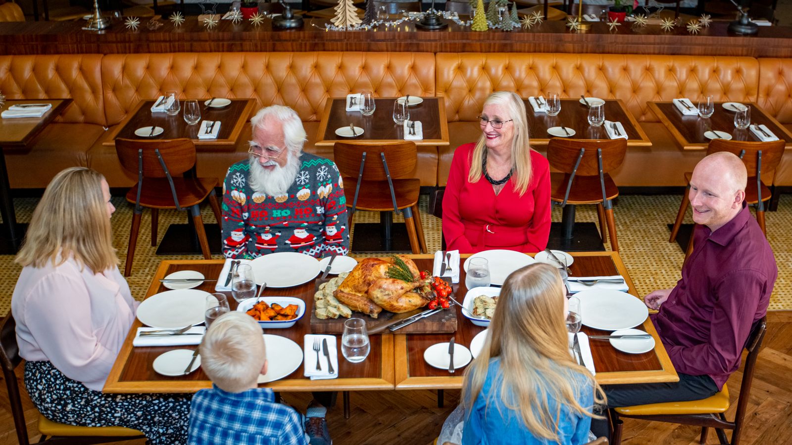 Family sharing a dinner at a restaurant