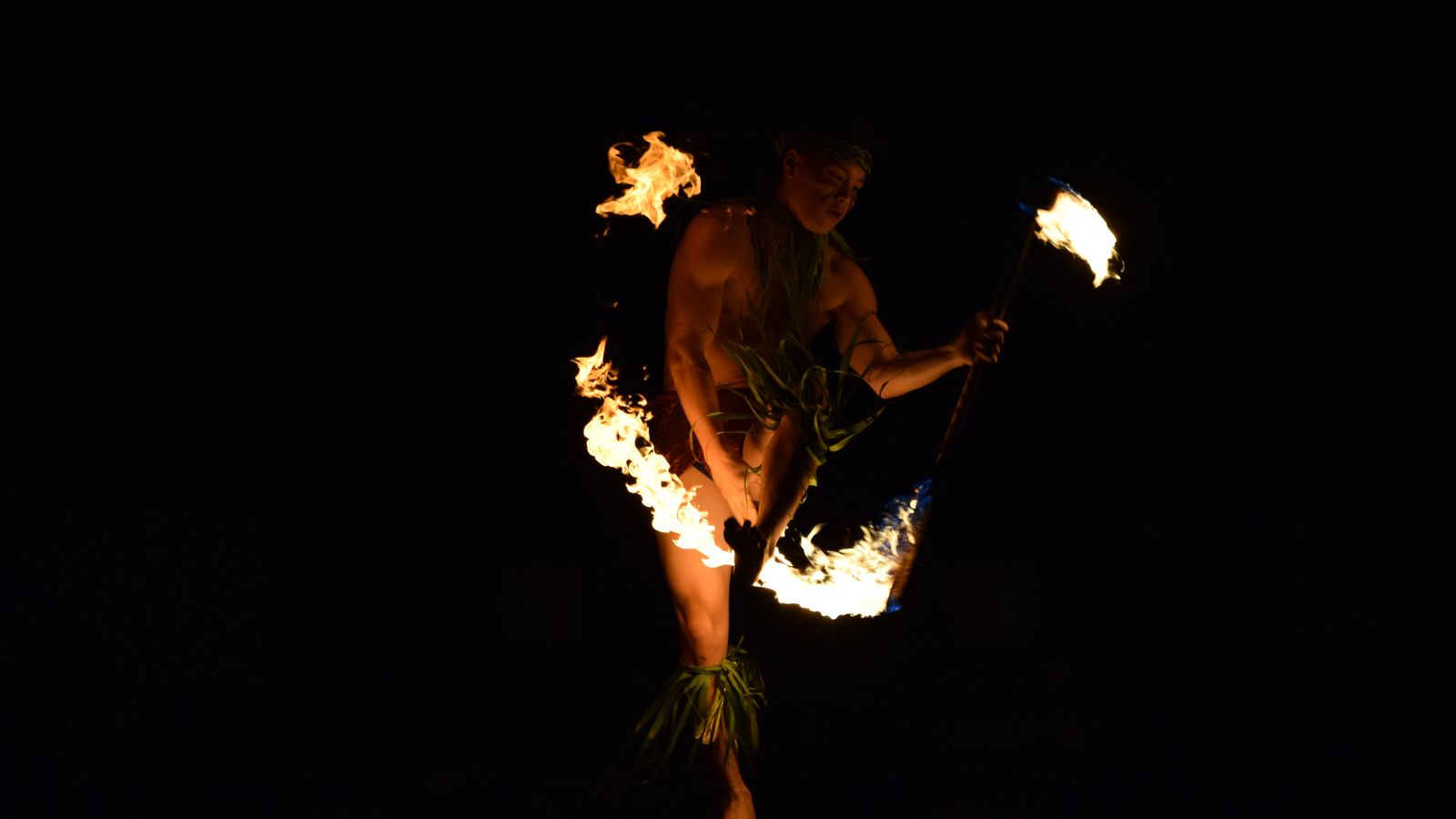 Fire dancer performing at night